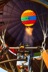 Looking Up Into the Envelope of a Hot Air Balloon as it Fires Up