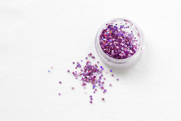 Glitter and sequins for nail design and makeup. decorations for fashion and beauty.