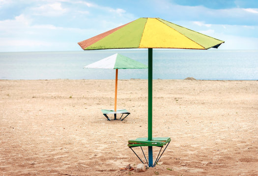 Multicolored umbrellas on the beach. Summer, sea, beach
