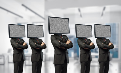 Businessmen with TV instead of head.