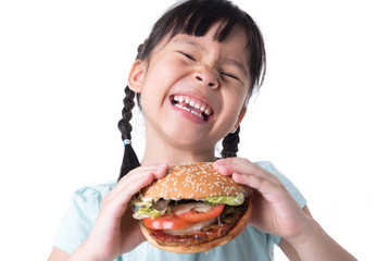 portrait of a beautiful girl, teenager and schoolgirl, holding a hamburger on a white background