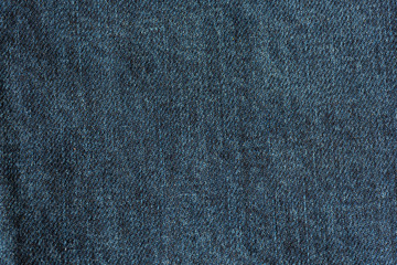 Denim jeans texture background. Texture of blue cotton fabric. Fabric structure.