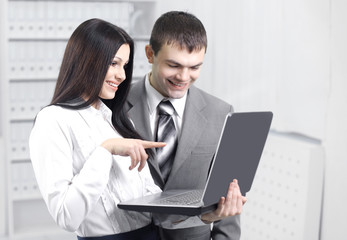 Fototapeta na wymiar employees communicating on the Internet using laptop.