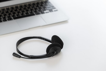 headset and computer laptop, call center support