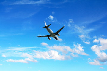 Fototapeta na wymiar Airplane on bluesky background