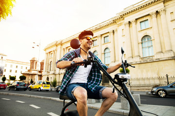 Obraz premium young man riding an electric vehicle
