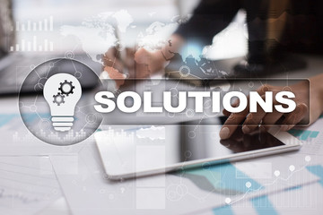 Business solutions concept on the virtual screen.