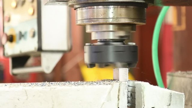 Metal machining. Mill cutting detail on milling machine.