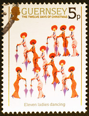 Twelve days of Christmas, 11 ladies dancing on postage stamp of Guernsey