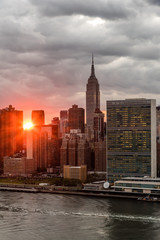 Obraz premium View of Empire State Building at sunset.