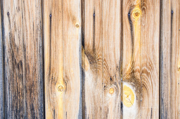 Background old planks with knots and cracks