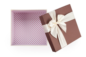 Open gift box with bow isolated on white