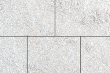 White stone floor tile pattern and seamless background