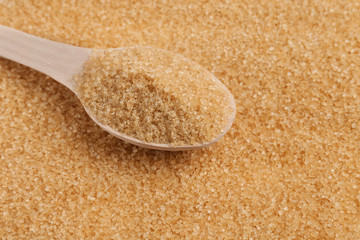 wooden spoon with cane sugar