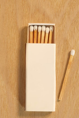 stick matches box on a wooden table