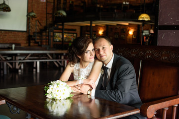tired wedding couple at the end of the wedding day 