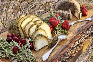 Italian flavors : typical Italian food products served on wooden table - selective focus