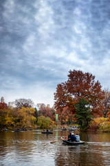 Fototapeta na wymiar Cloudy autumn day at The Lake in Central Park, New York, New York.