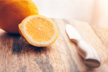 Close-up of a lemon on a cutting board