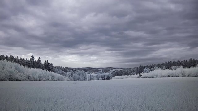 infrared photography - ir video clip of landscape under sky with clouds - the art of our world in the infrared spectrum