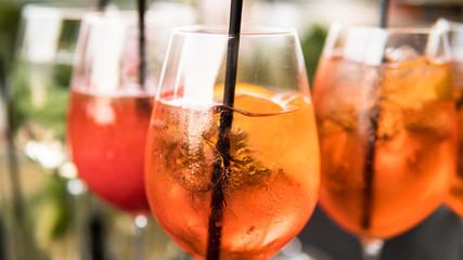 .summer citrus cold alcohol drink Aperol Spritz close-up