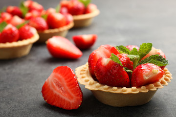 Ripe strawberries in tartlets
