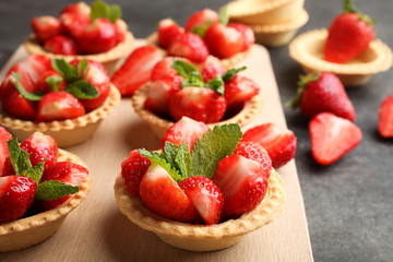 Ripe strawberries in tartlets