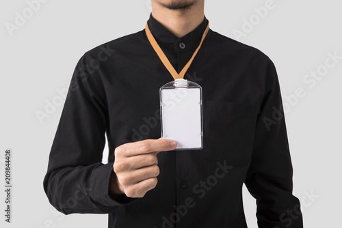 employee hand showing blank id card badge holder for mockup template