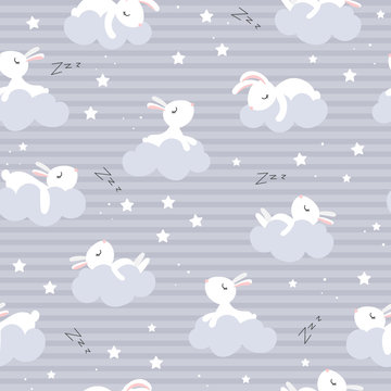 Seamless pattern with cute sleeping rabbits