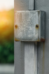 outdoor lightning protection box on wall with sunlight effect