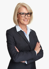 Middle aged businesswoman wearing glasses. Isolated