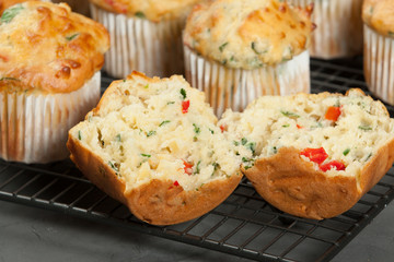 Fototapeta na wymiar Home Baked Cheese And Vegetables Muffins With Pepper, Spinach, Sweetcorn, Mature Gouda.