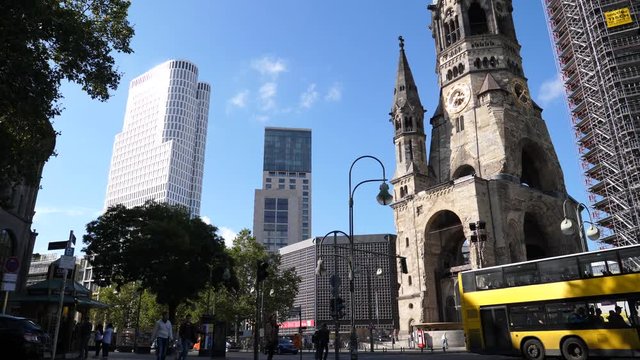 Berlin city center architecture, office high raise building and Kaiser Wilhelm Memorial Church