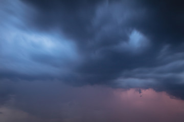 Fototapeta premium Thunderclouds in the sky as a background