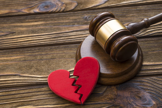 broken heart and hammer of the judge. Concept court, divorce, division of property, marriage contract