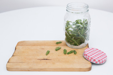 fresh pine in the glass jar, ready for winter