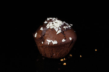 Chocolate muffin on a dark background