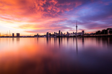 Fototapeta na wymiar Sun rising over Auckland city, city scape, silhouette, New Zealand