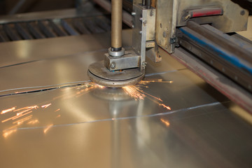 Plasma cutting of metal.Cutting of metal. Sparks fly from laser