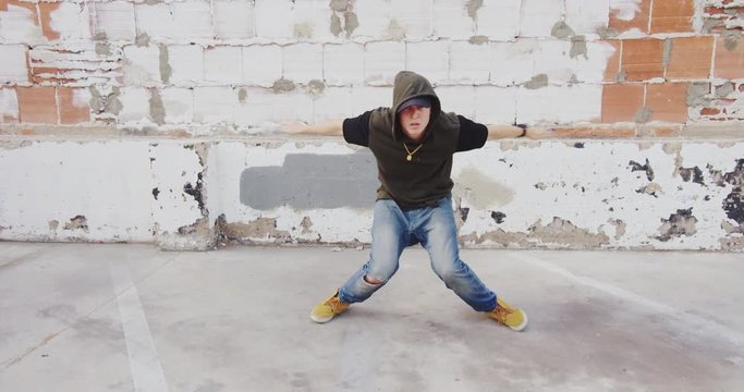 Hip hop dancer freestyling outside in city