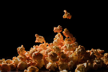 Popcorn pile isolated on black background