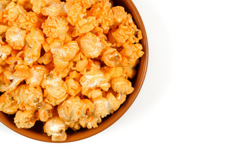 View from above popcorn in the bowl isolated on the white background