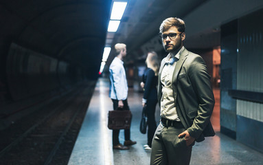 Business people waiting for subway
