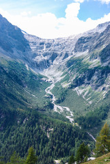 Fototapeta na wymiar Waterfall form Adamello perennial glacier