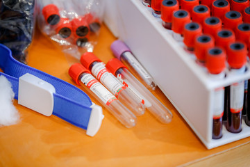 ampoules for donating blood lie in a drawer on the table