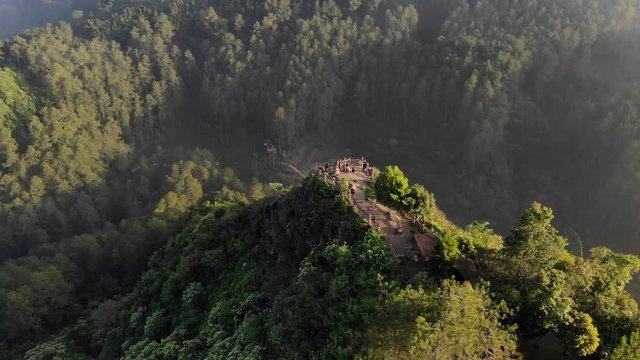Beautiful Aerial sequence clip of mountain valley in the morning at Tebing Keraton, Bandung, Indonesia.