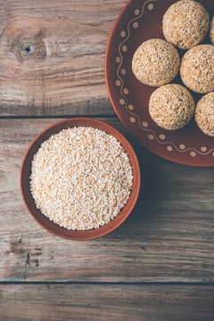 Amaranth or rajgira lahi in a bowl with sweet laddu. selective focus
