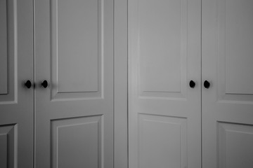 double closet doors dark black and white modern interior close-up