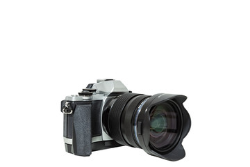 Close up of mirrorless or digital camera isolated on white background.