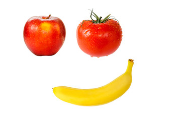 Smiling face from a banana, an apple and a tomato. Isolated on white background.
